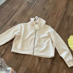 Brand new cream hoodie size XL